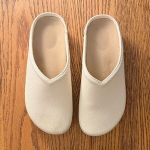 Rothy's Cream Slip-On Shoes with Brown Soles